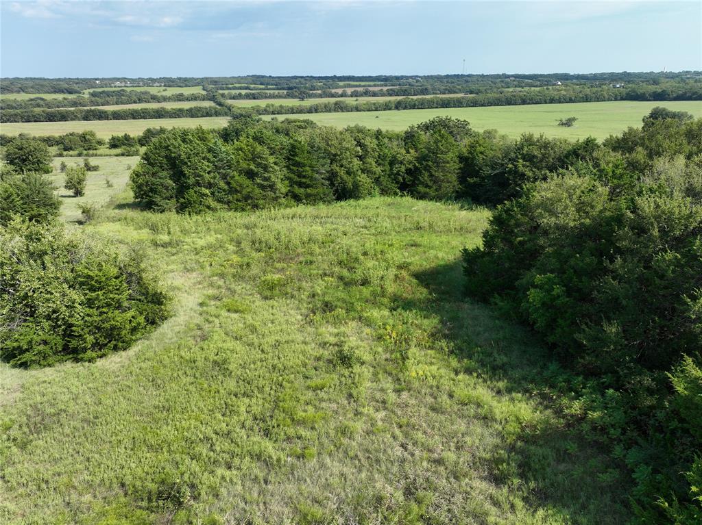 0 Hall Road Sherman, TX 75090 - Photo 8 of 11 a view of a lake with a city