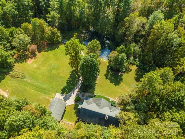 a view of a lake with a yard