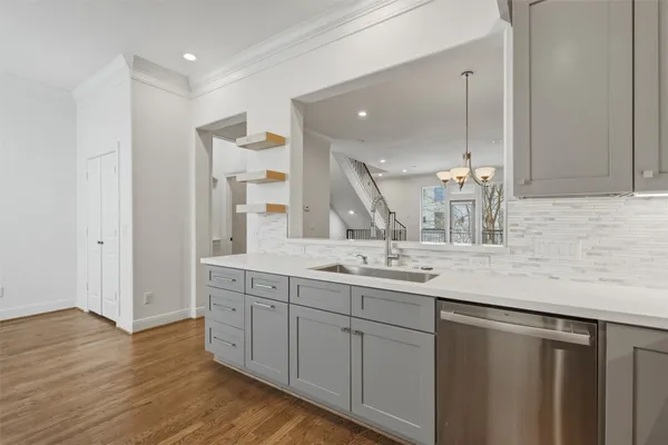 a bathroom with a double vanity sink and mirror