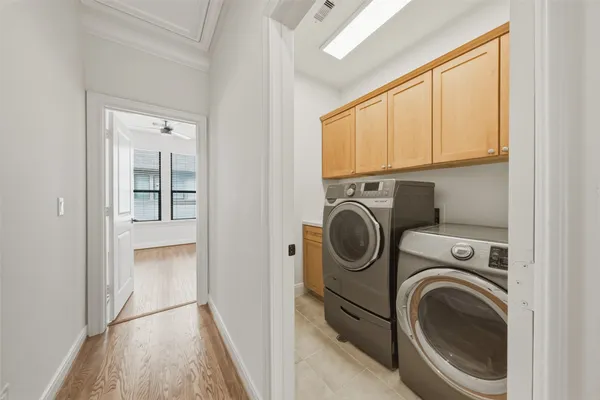 a view of a storage & utility room with washer and dryer