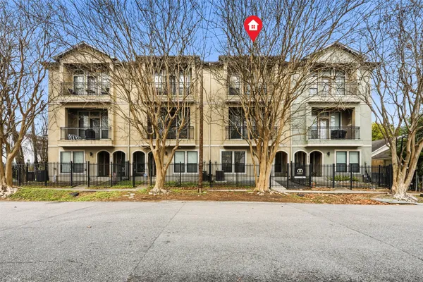 a front view of a building with street view