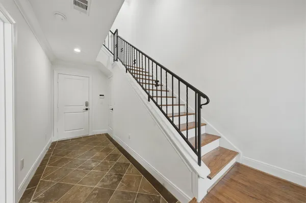 a view of entryway with stairs