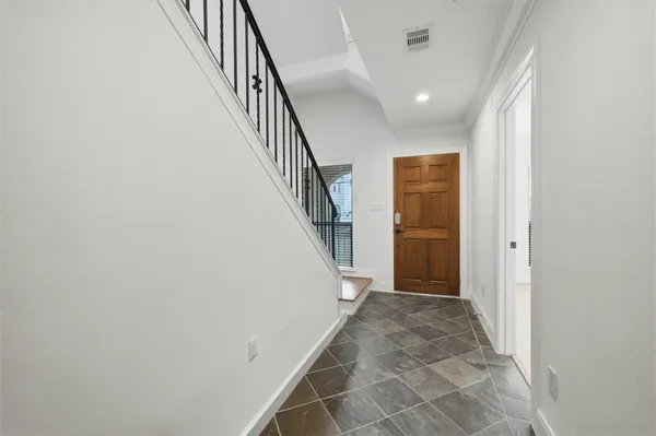 a view of hallway with stairs