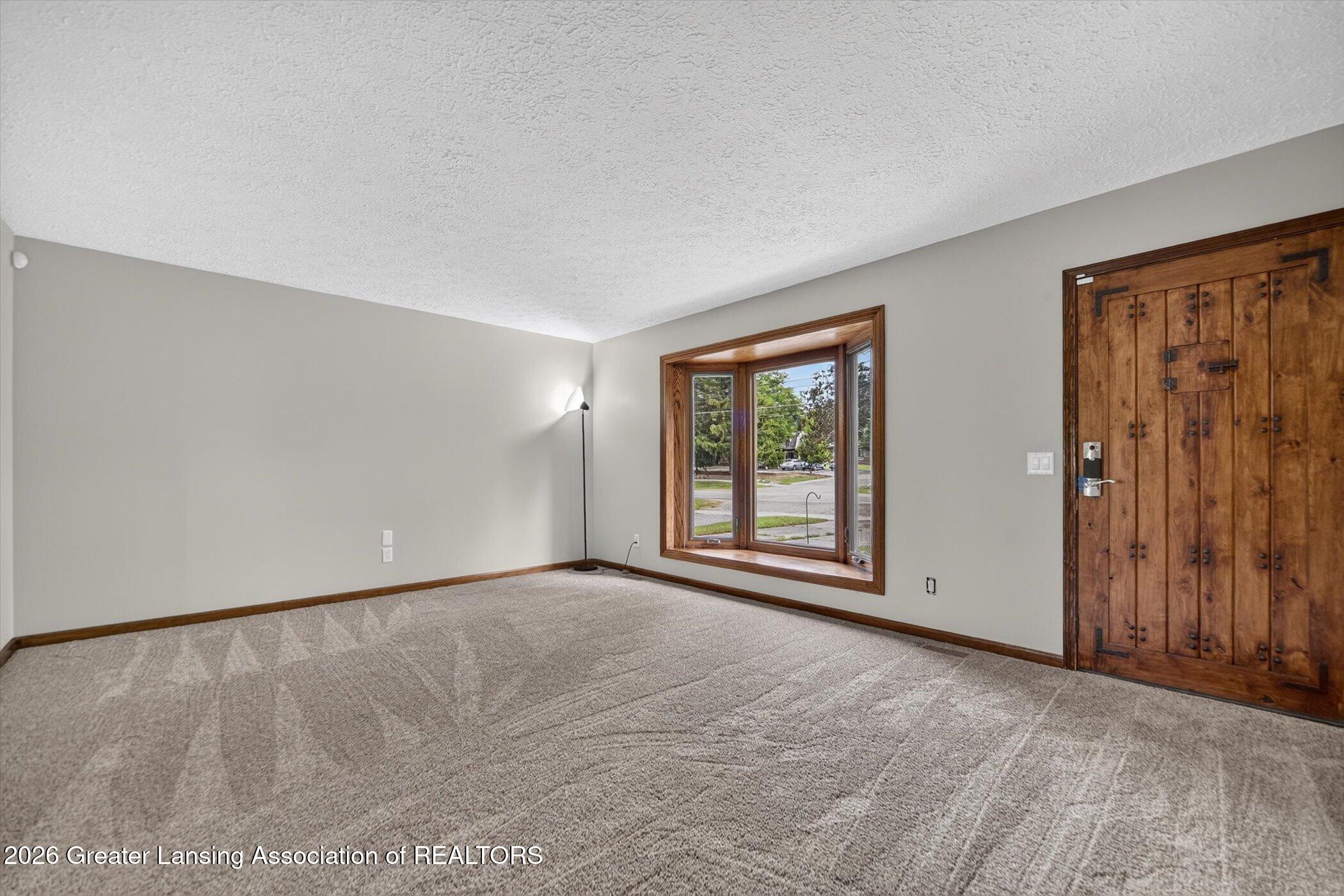 1817 Hamilton Road Okemos, MI 48864 - Photo 7 of 34 09-1817-Hamilton-Rd-Windowstill-Photogra