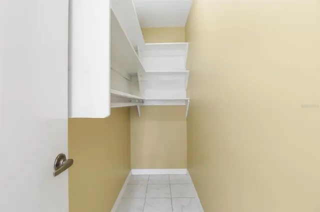 a bathroom with a sink mirror toilet and shower