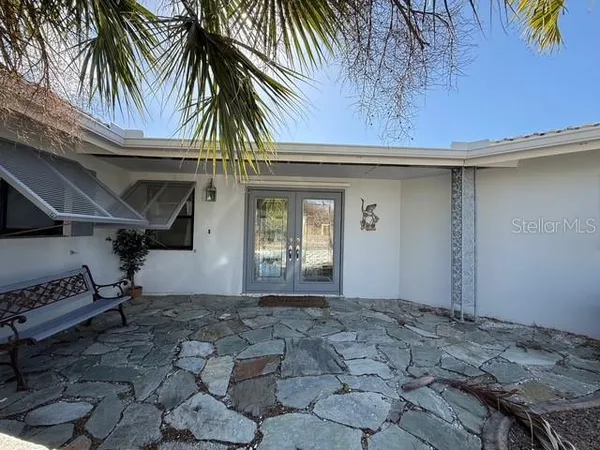 a view of a house with a patio