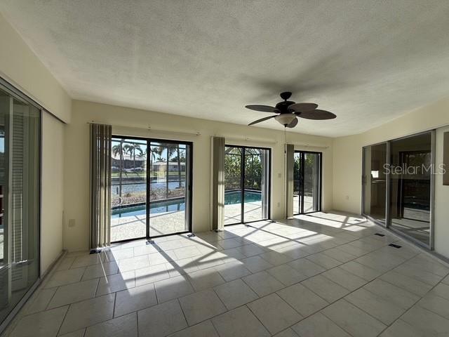 191 Maria Court Punta Gorda, FL 33950 - Photo 10 of 24 a living room with a large window