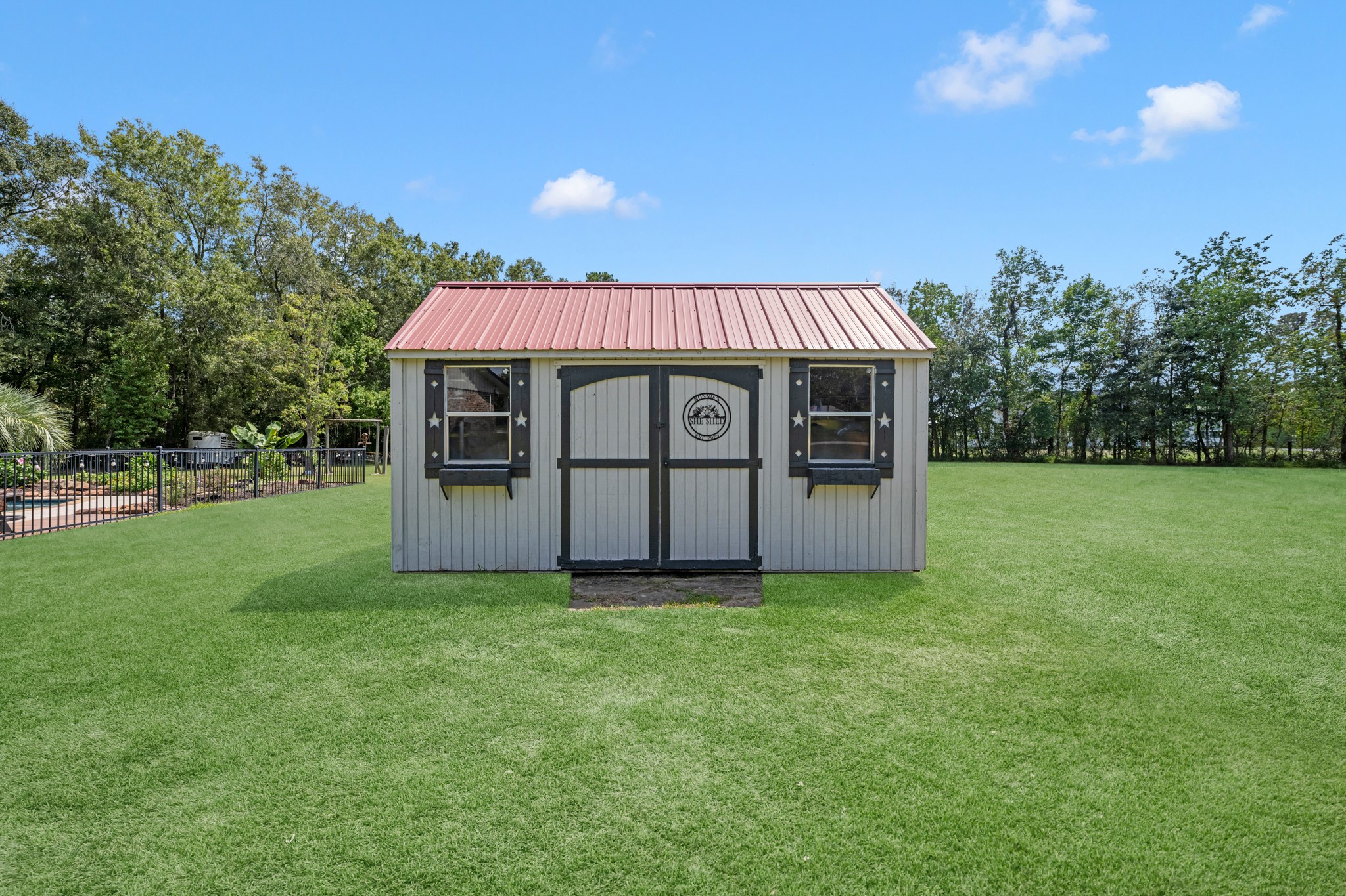 22698 Brook Forest Road New Caney, TX 77357 - Photo 39 of 46 Large walk-in storage/tool shed offers fantastic additional storage and workspace!