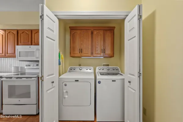 a utility room with dryer and washer