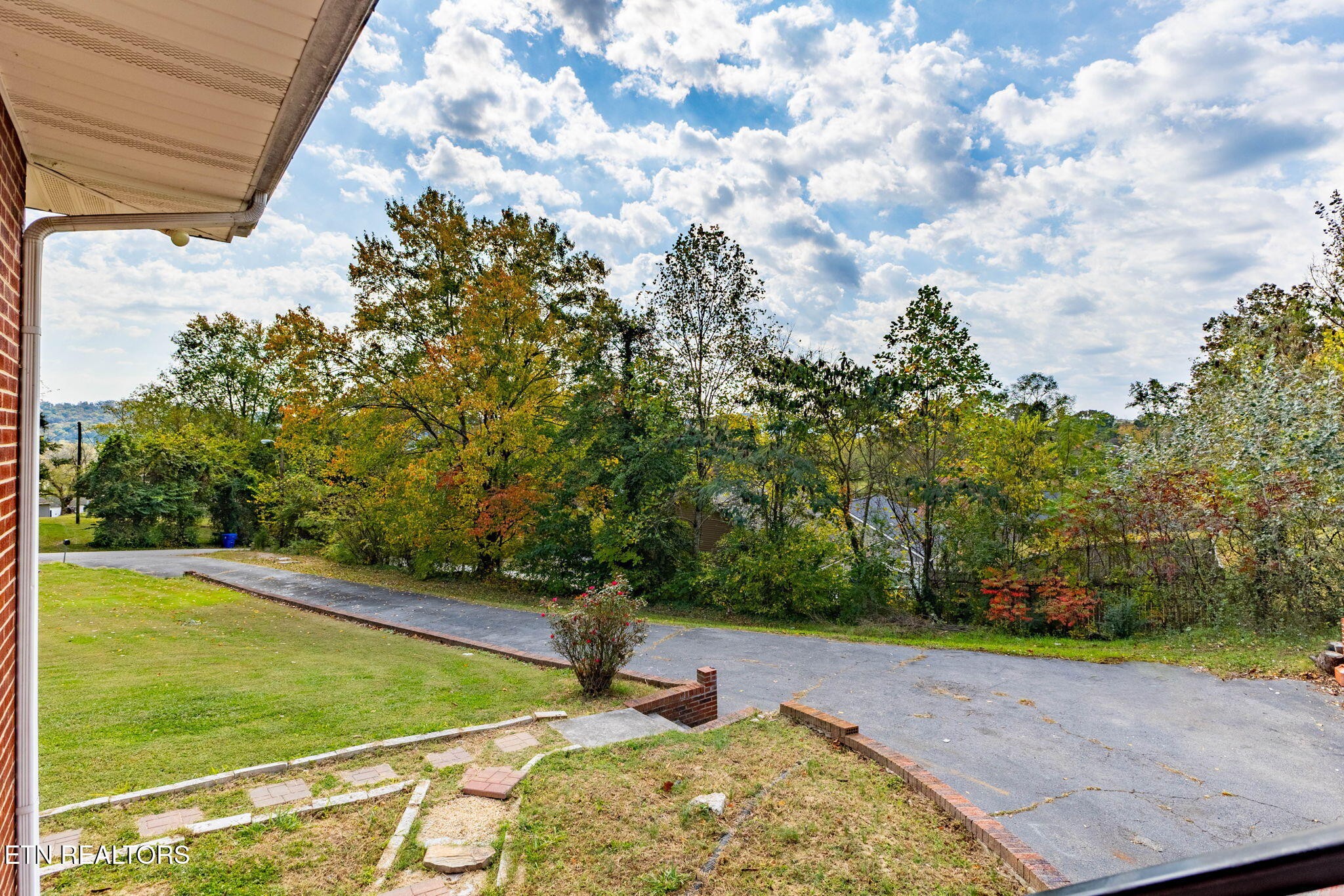 302 Hickory Street Clinton, TN 37716 - Photo 10 of 38 a view of a backyard