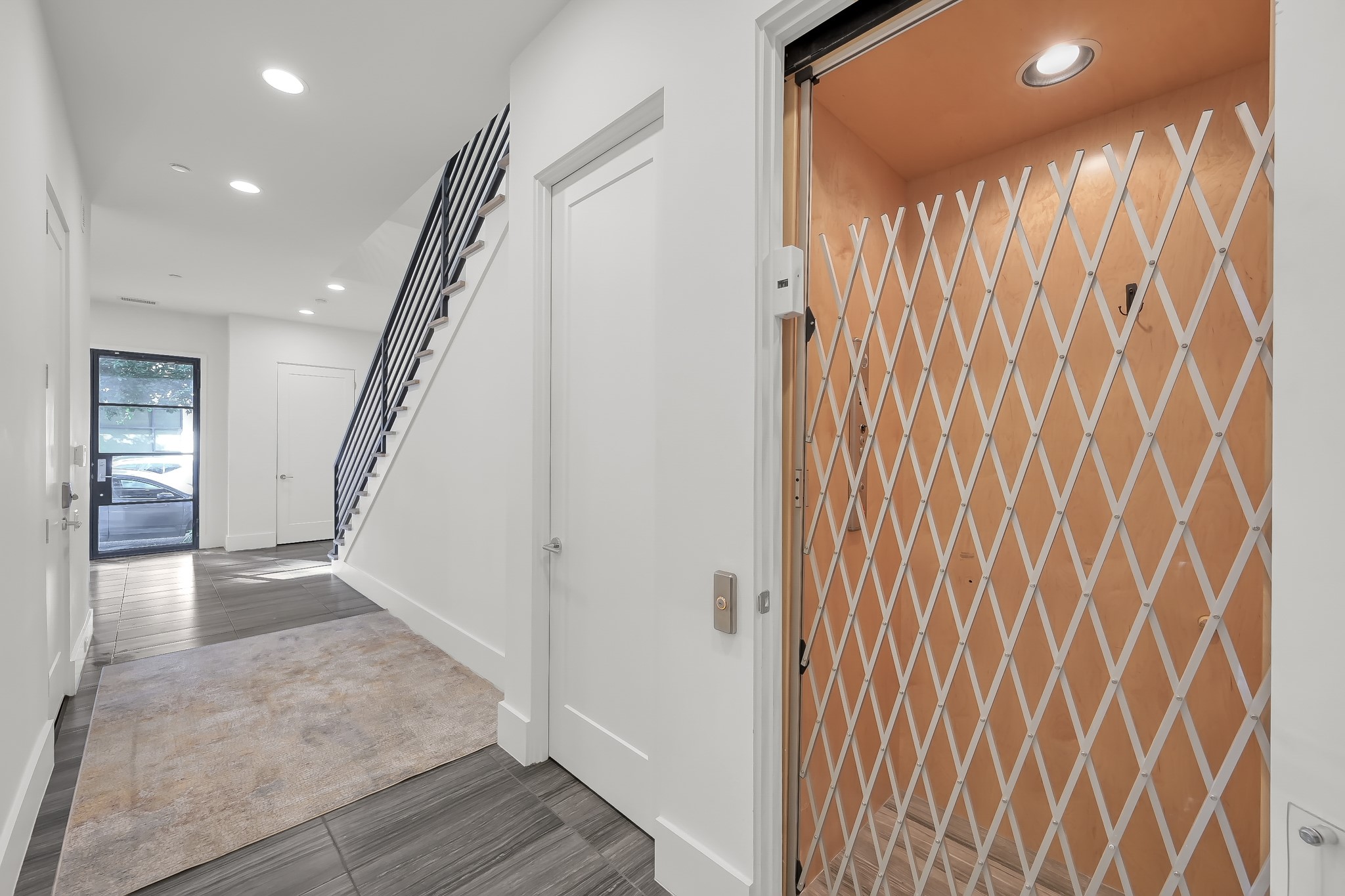 3207 Revere Street Houston, TX 77098 - Photo 15 of 50 a view of entryway with wooden floor