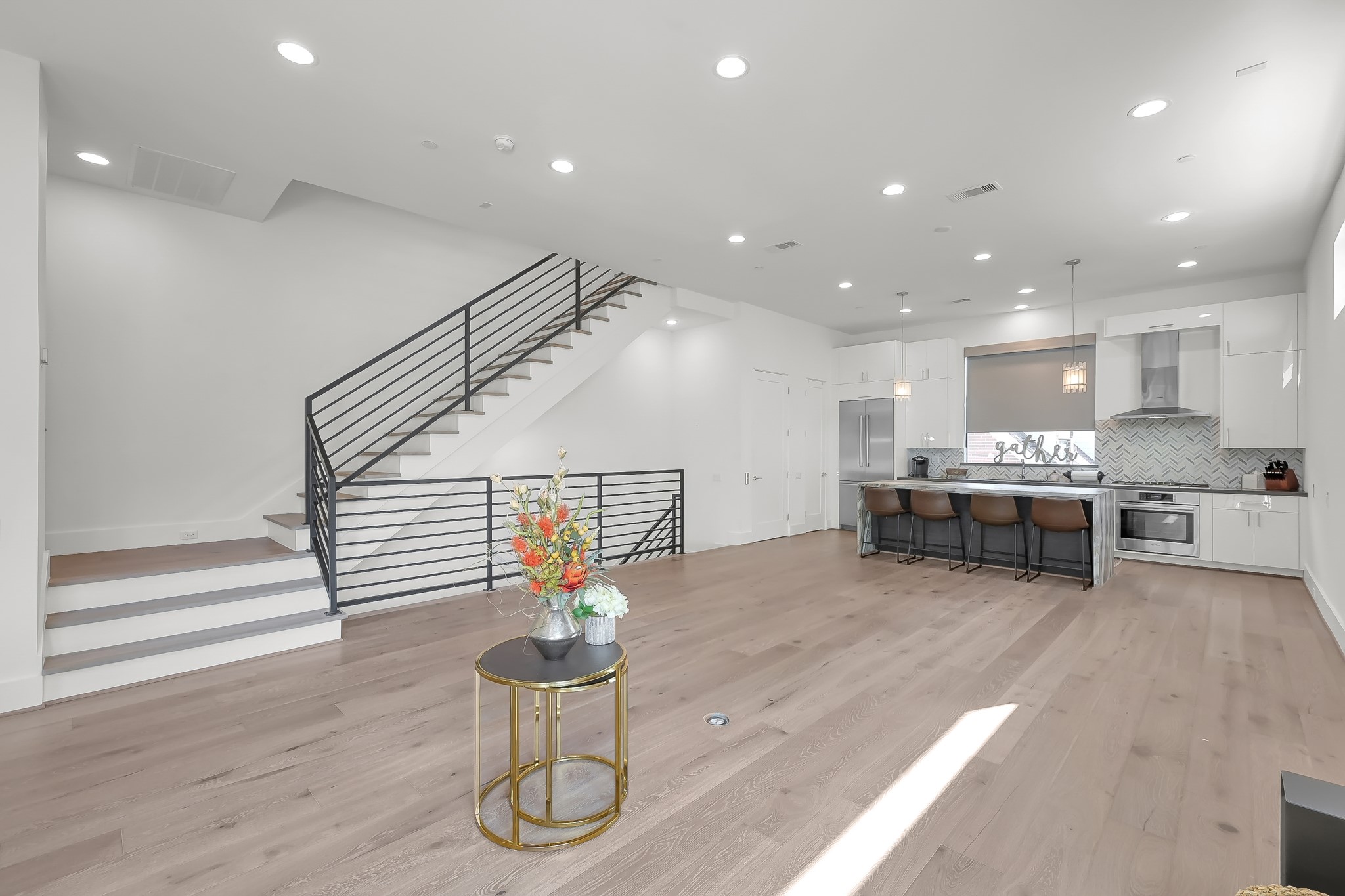 3207 Revere Street Houston, TX 77098 - Photo 26 of 50 a living room with furniture and kitchen view