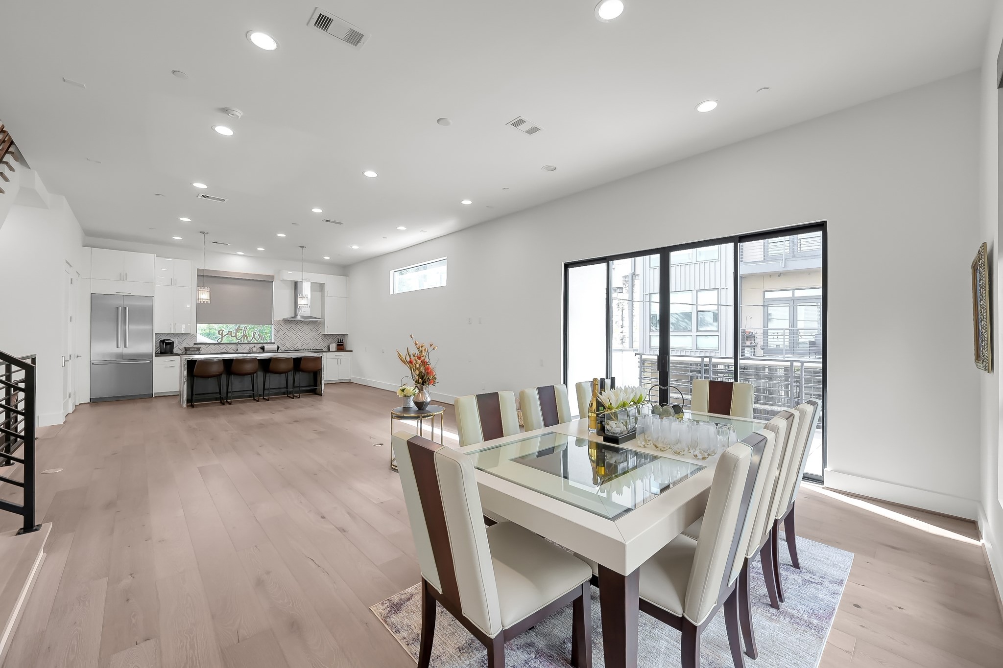 3207 Revere Street Houston, TX 77098 - Photo 29 of 50 a view of a dining room with furniture window and wooden floor