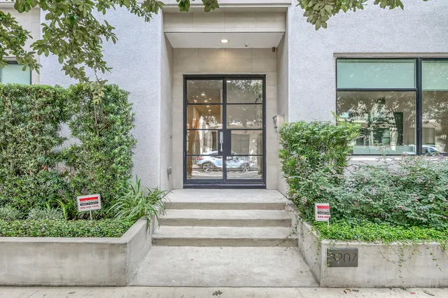 a front view of a house with a porch
