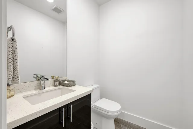 a bathroom with a sink and a toilet