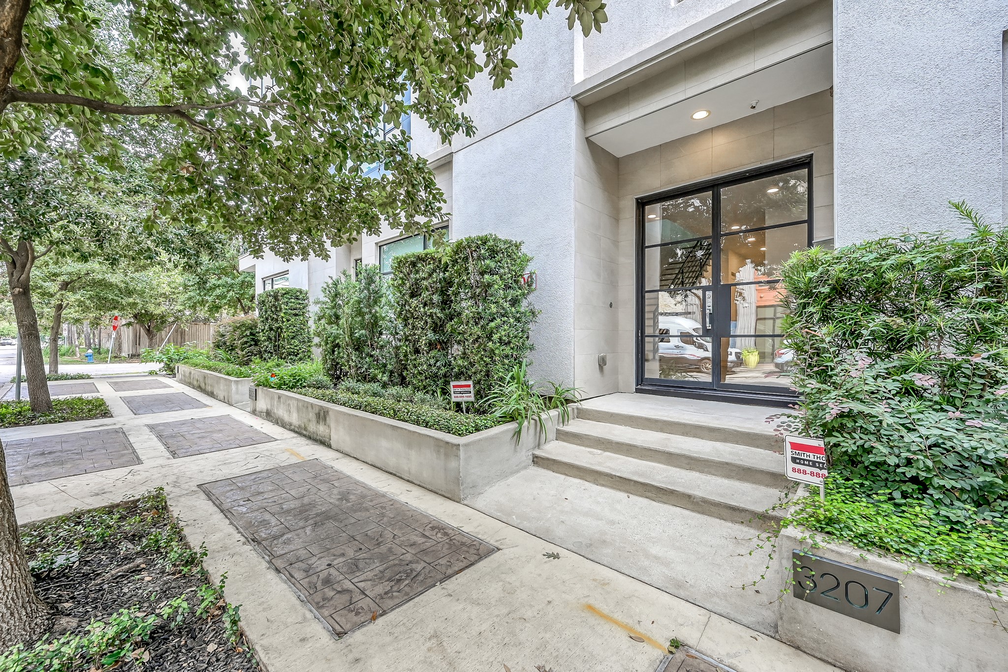 3207 Revere Street Houston, TX 77098 - Photo 4 of 50 a view of a house with potted plants