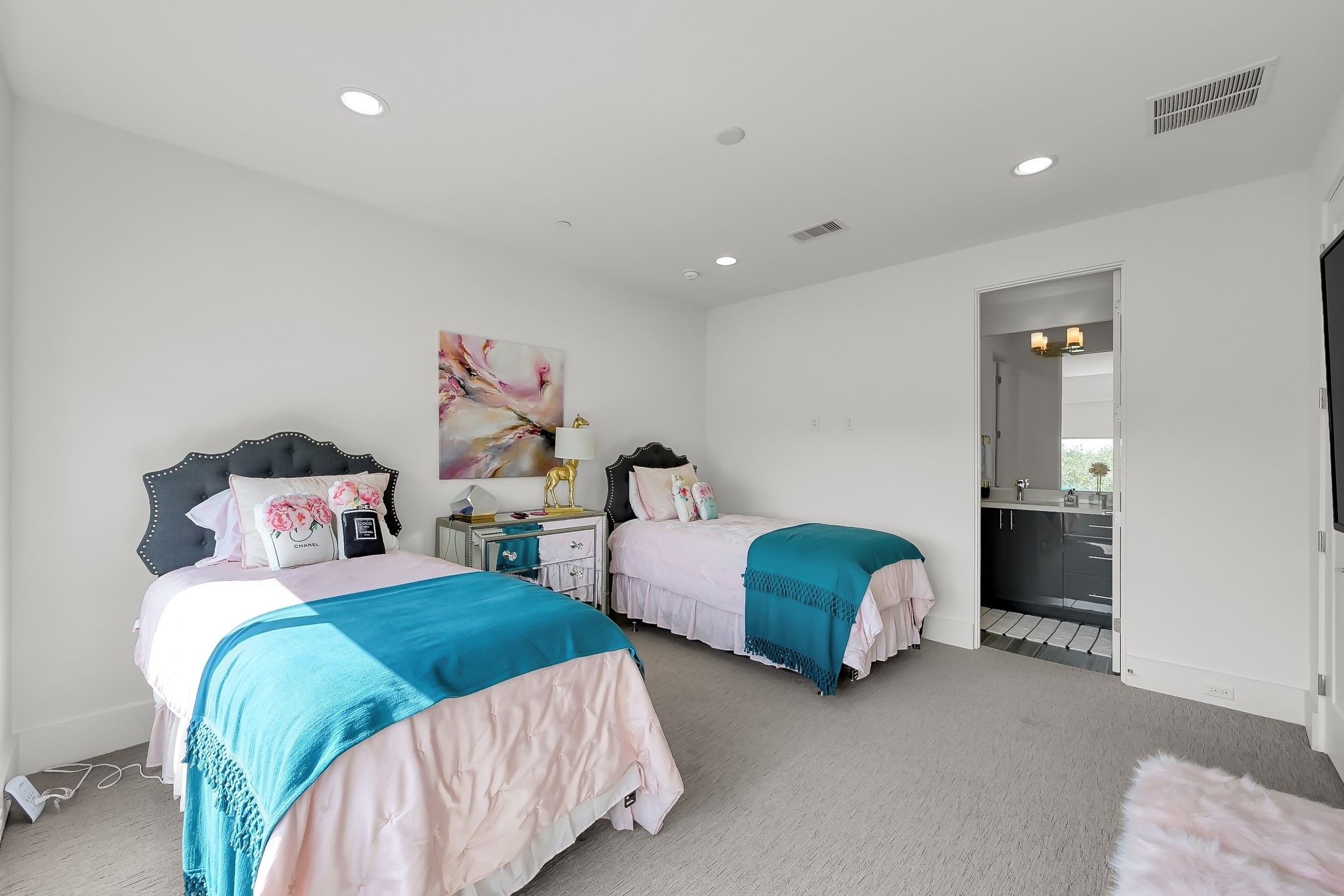 3207 Revere Street Houston, TX 77098 - Photo 43 of 50 a bedroom with two beds and a couch