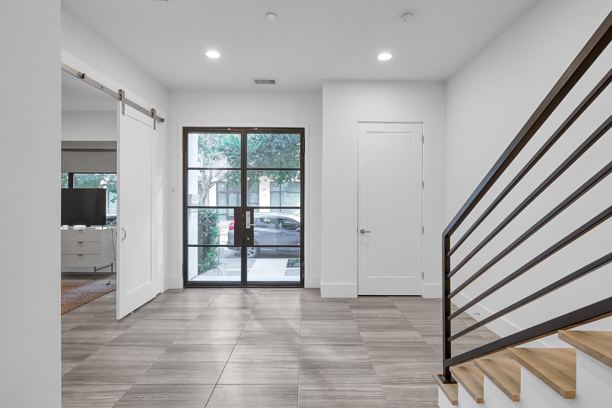 3207 Revere Street Houston, TX 77098 - Photo 10 of 50 a view of entryway with stairs