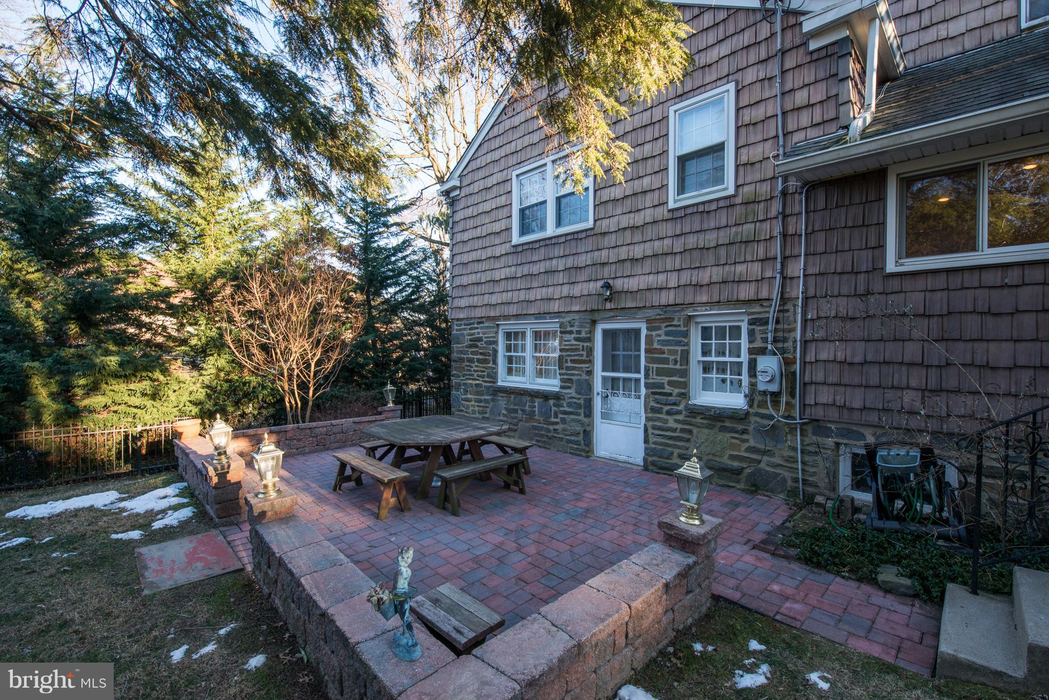 160 Whitemarsh Road Ardmore, PA 19003 - Photo 3 of 30 brick paver patio with sitting wall