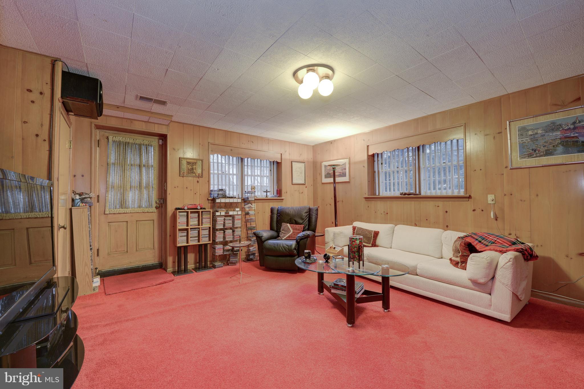 160 Whitemarsh Road Ardmore, PA 19003 - Photo 23 of 30 family room with door to outside patio
