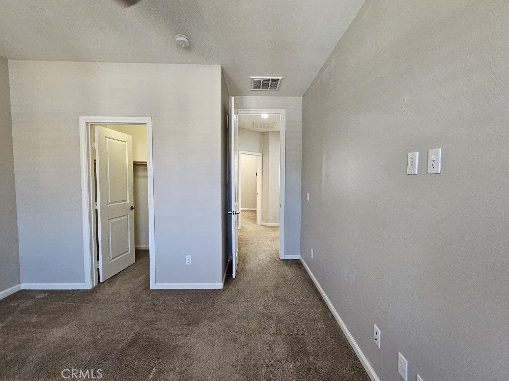 44011 Rivo Court Temecula, CA 92592 - Photo 22 of 34 an empty room with a bathroom