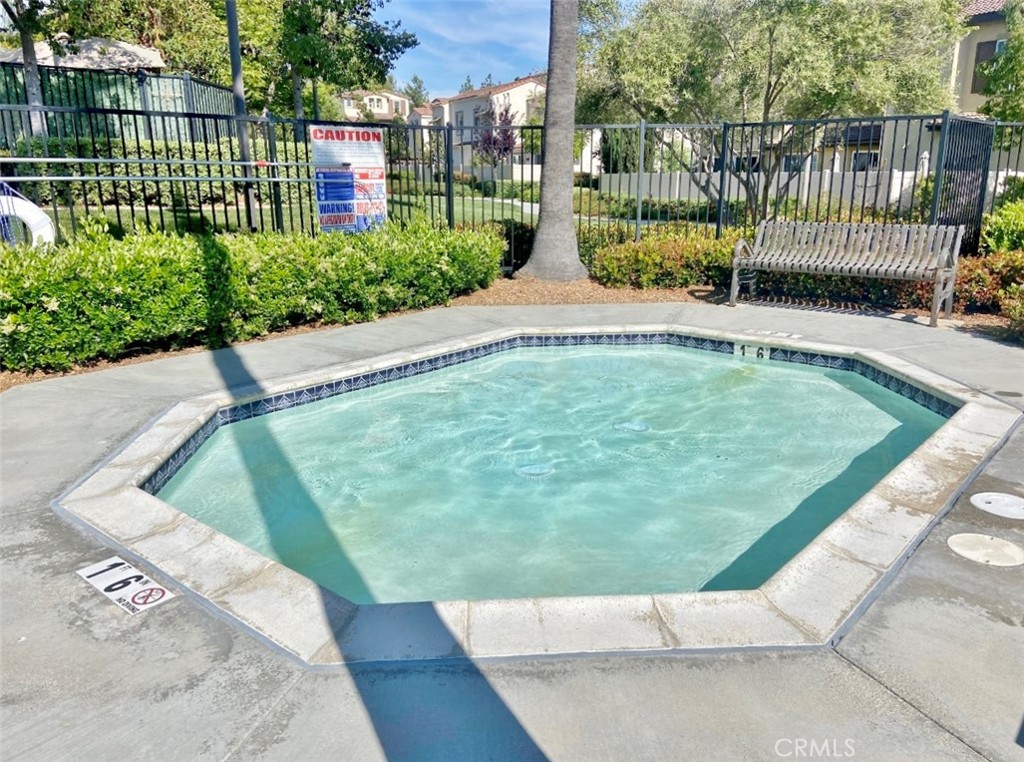 44011 Rivo Court Temecula, CA 92592 - Photo 32 of 34 a view of a backyard with a garden
