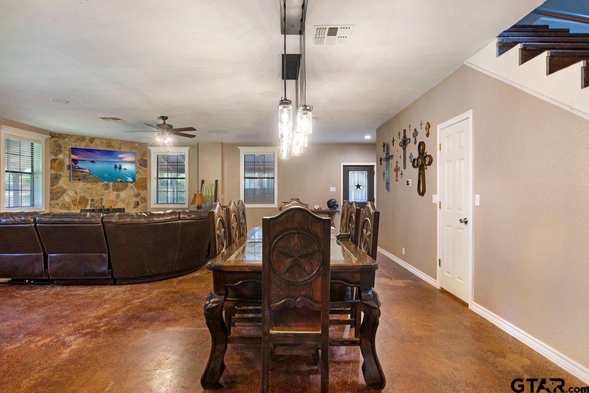 1254 Corinth Road Jacksonville, TX 75766 - Photo 31 of 42 a view of a dining room with furniture