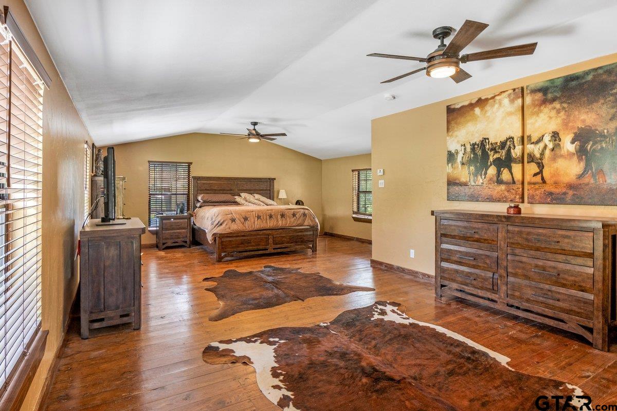 1254 Corinth Road Jacksonville, TX 75766 - Photo 9 of 42 a living room with furniture and a flat screen tv