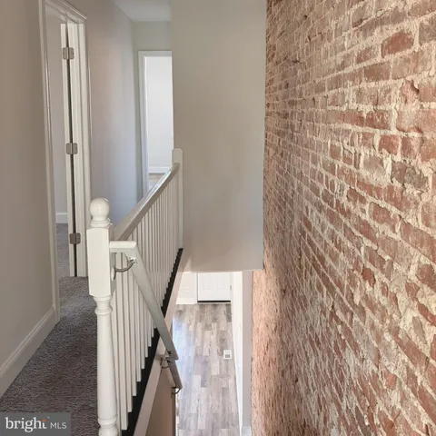 a view of entryway with a front door