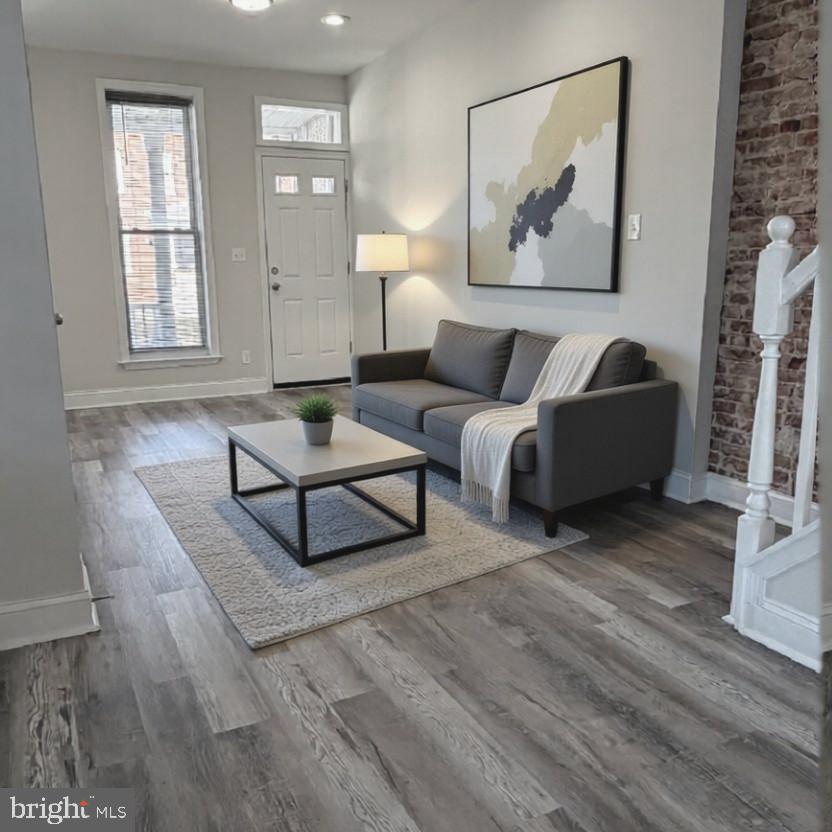 2631 West Cold Spring Lane Baltimore, MD 21215 - Photo 3 of 20 a living room with furniture and wooden floor