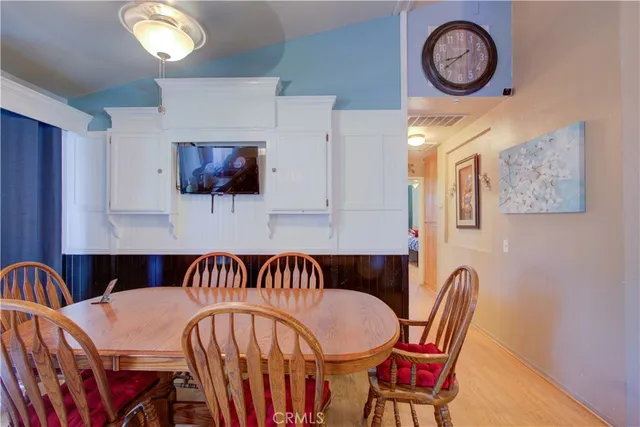 a view of a table and chairs in a kitchen
