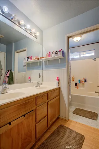 a bathroom with a tub and a sink