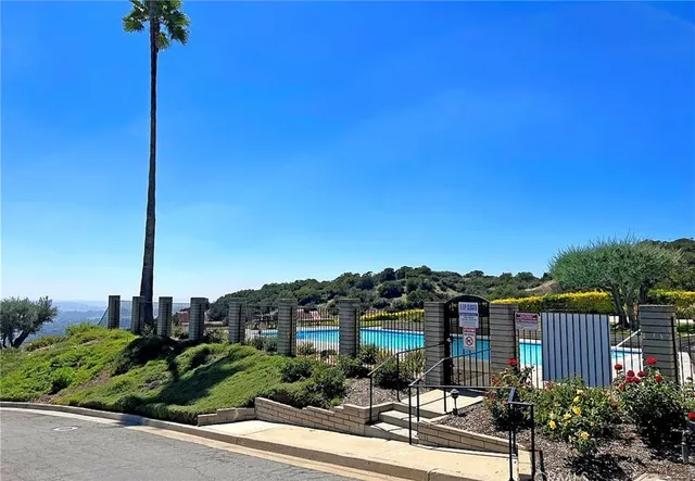 a view of a city with tall buildings