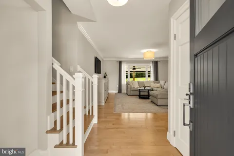 a view of a livingroom with furniture and white walls