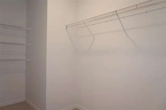 a view of a window in an empty room