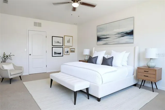 a bathroom with a granite countertop sink a mirror and a shower