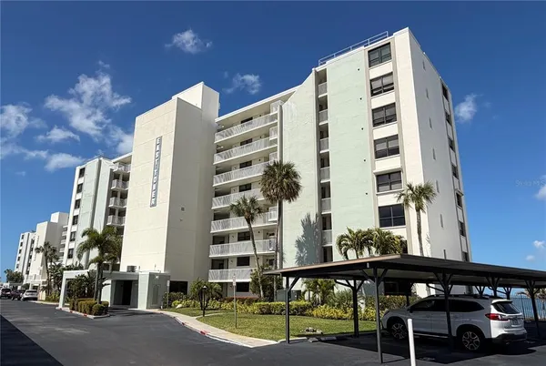 a front view of a building with glass windows