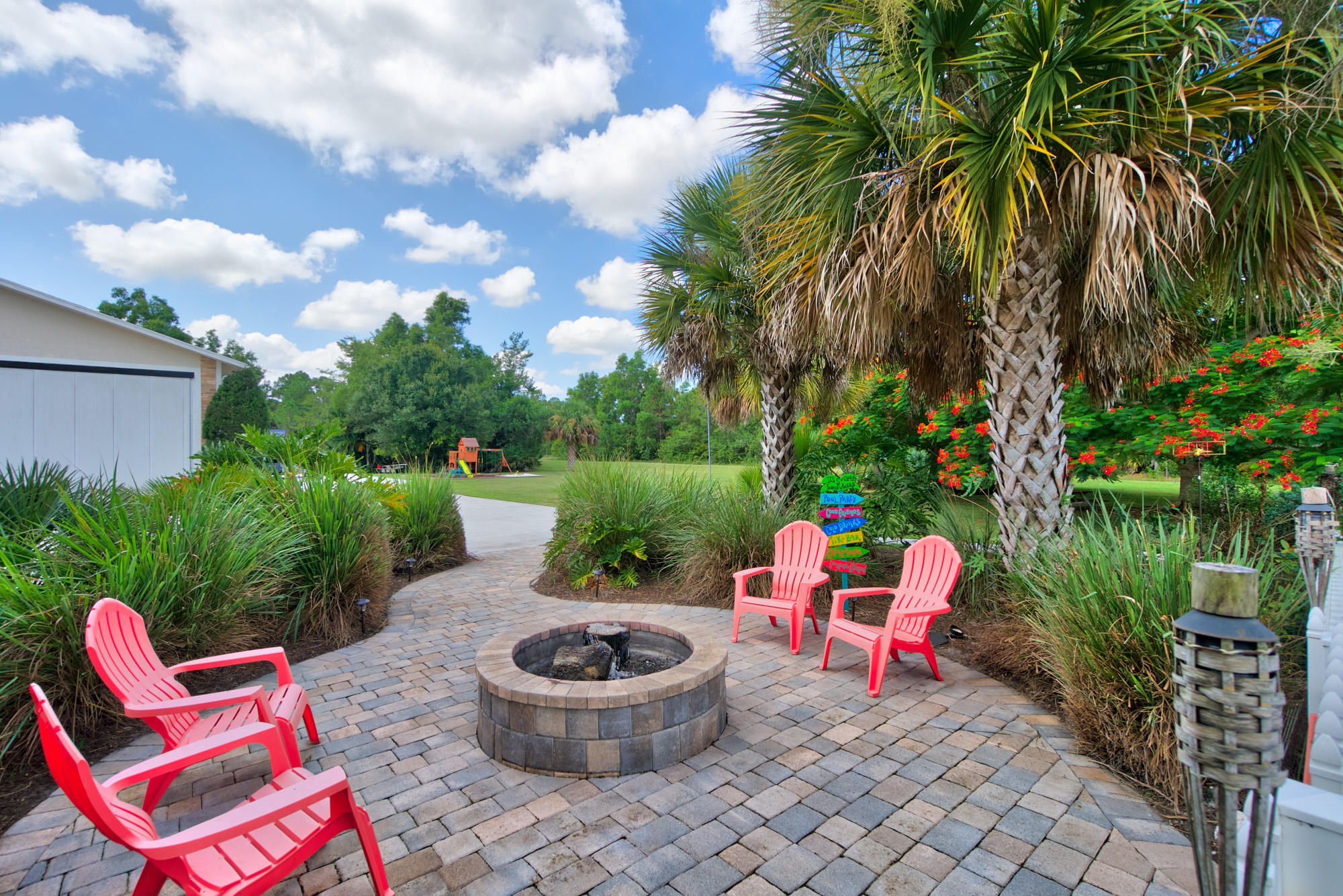 3240 Southeast Chandelle Road Jupiter, FL 33478 - Photo 16 of 30 Evening fire pit area