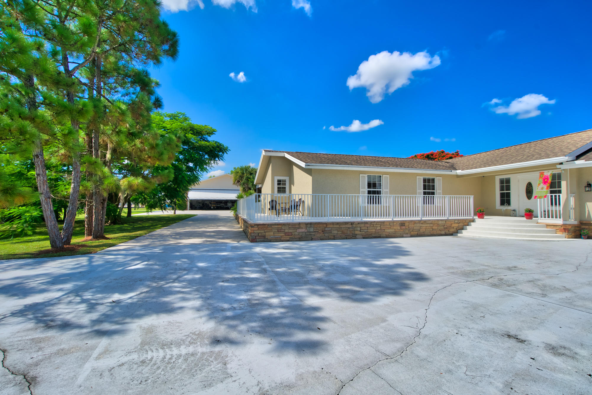 3240 Southeast Chandelle Road Jupiter, FL 33478 - Photo 4 of 30 Front elevation, plenty of parking