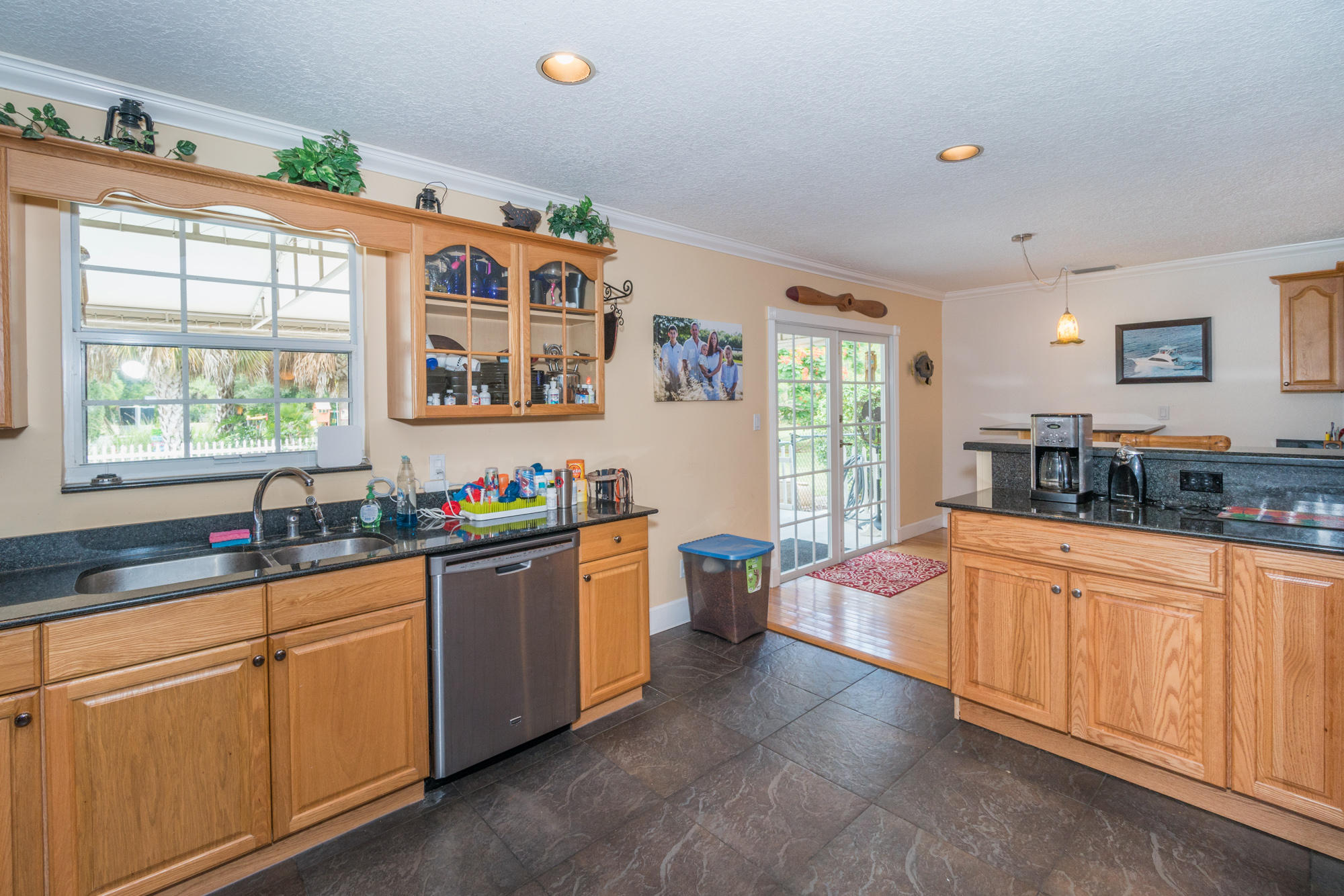 3240 Southeast Chandelle Road Jupiter, FL 33478 - Photo 6 of 30 Kitchen opens to living areas