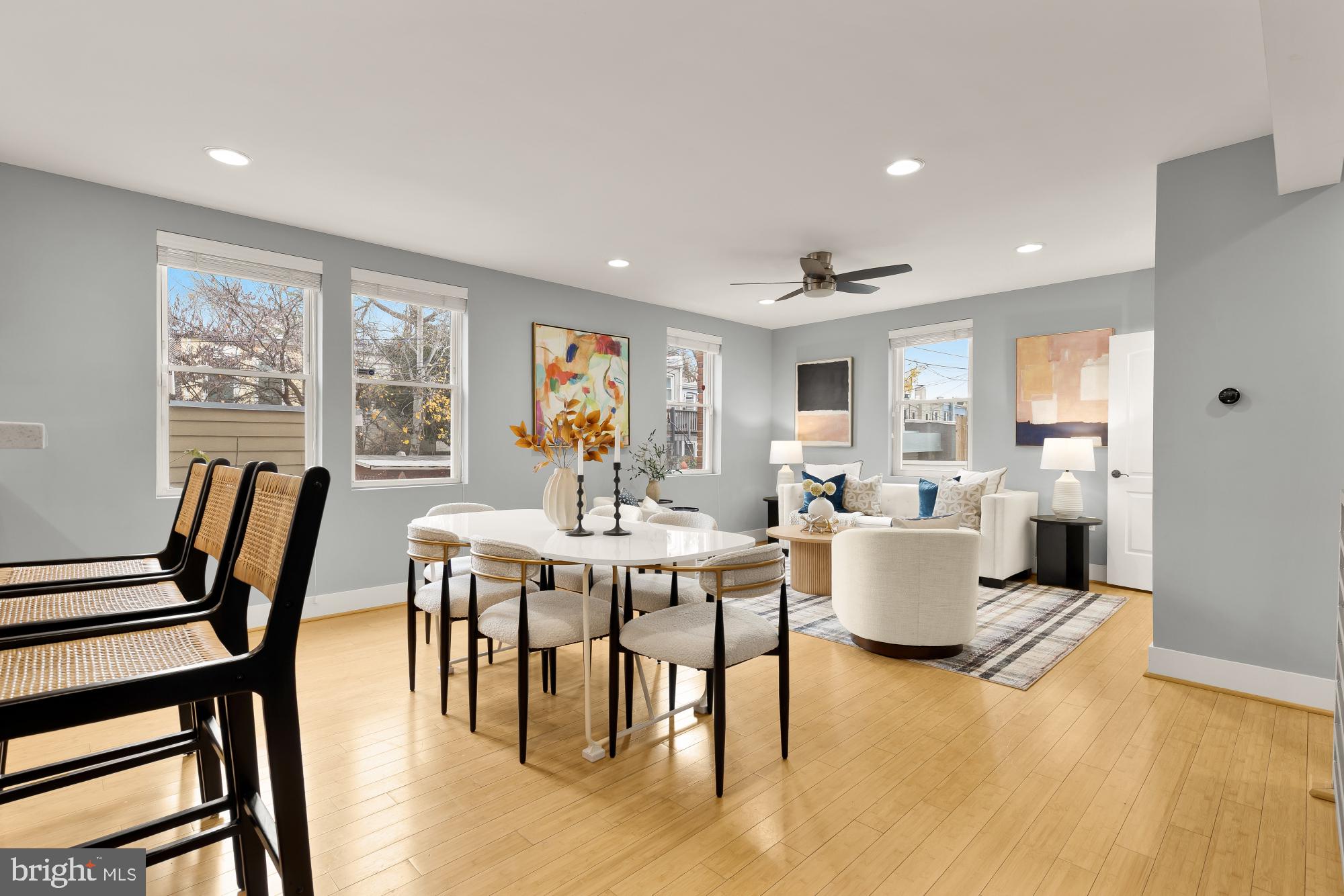 a view of a dining room with furniture window and wooden floor