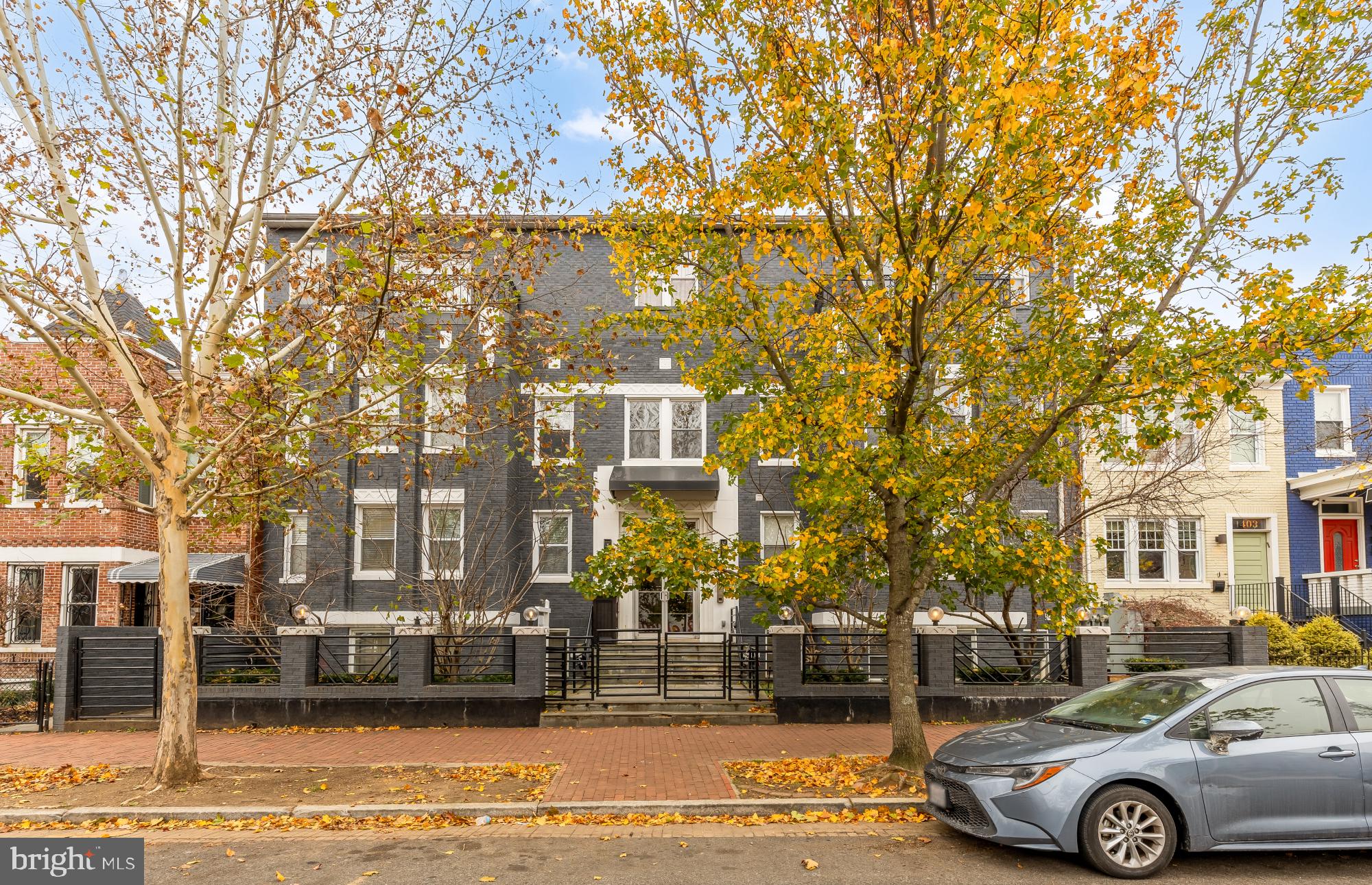 1409 G Street Northeast, Unit 5 Washington, DC 20002 - Photo 2 of 29 a front view of a building with trees