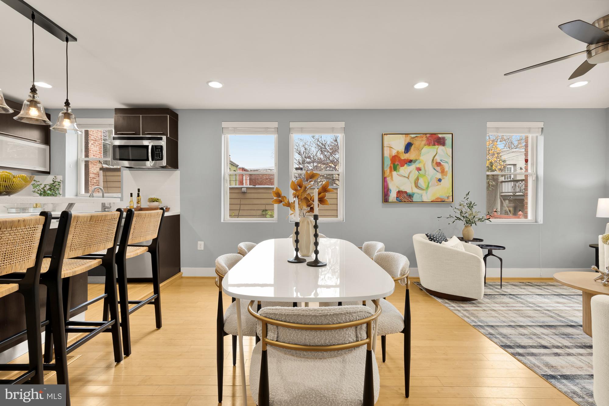 1409 G Street Northeast, Unit 5 Washington, DC 20002 - Photo 10 of 29 a living room with furniture and painting on the wall