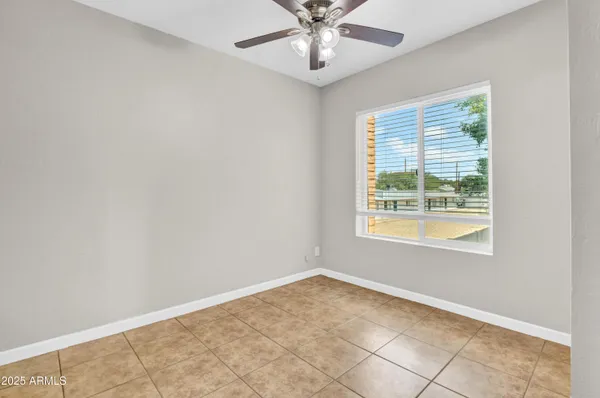 a white refrigerator freezer and a stove sitting inside of a kitchen