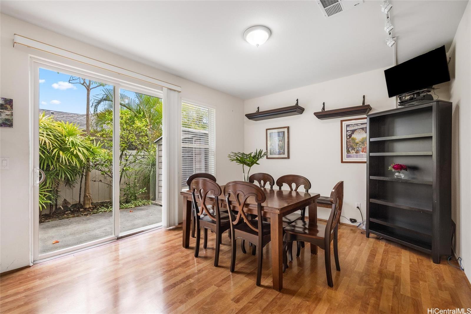 520 Lunalilo Home Road, Unit 313 Honolulu, HI 96825 - Photo 10 of 25 a view of a dining room with furniture window and outside view