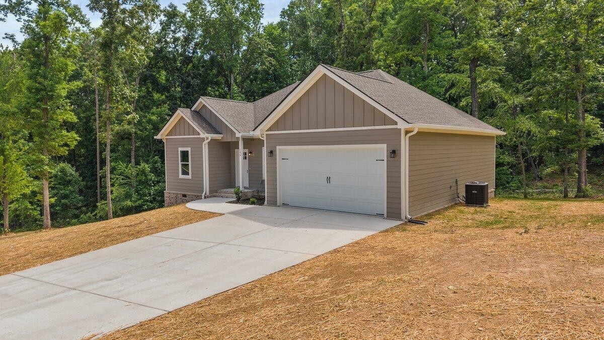 129 County Road 155 Riceville, TN 37370 - Photo 30 of 31 a view of a house with a yard