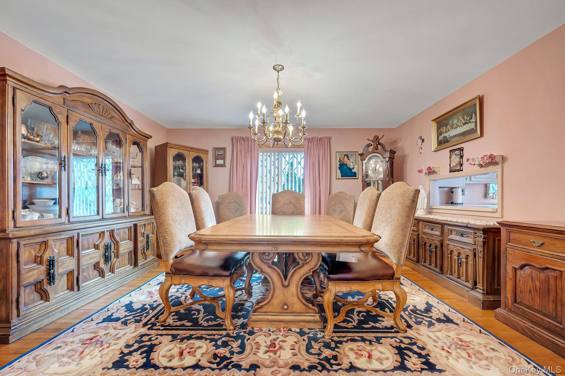97 Bradley Road Scarsdale, NY 10583 - Photo 6 of 27 a view of a dining room with furniture a rug and wooden floor