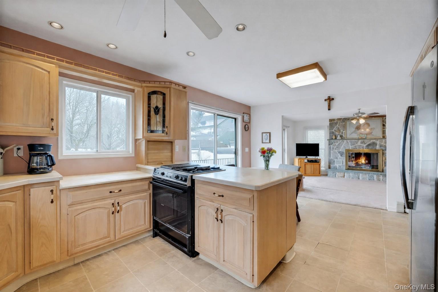 97 Bradley Road Scarsdale, NY 10583 - Photo 8 of 27 a kitchen with white cabinets and sink