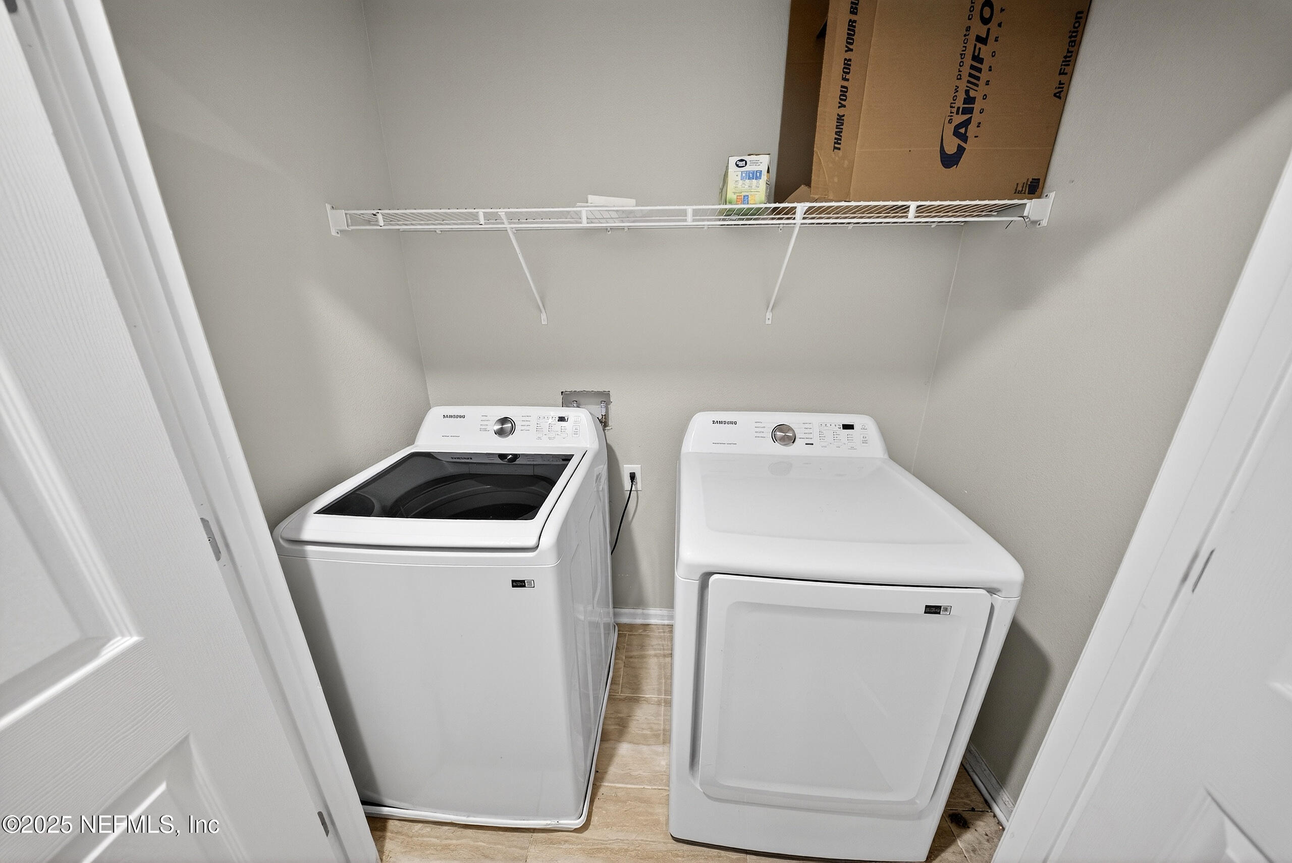 9810 Fiddleback Lane Jacksonville, FL 32222 - Photo 14 of 20 a utility room with dryer and washer