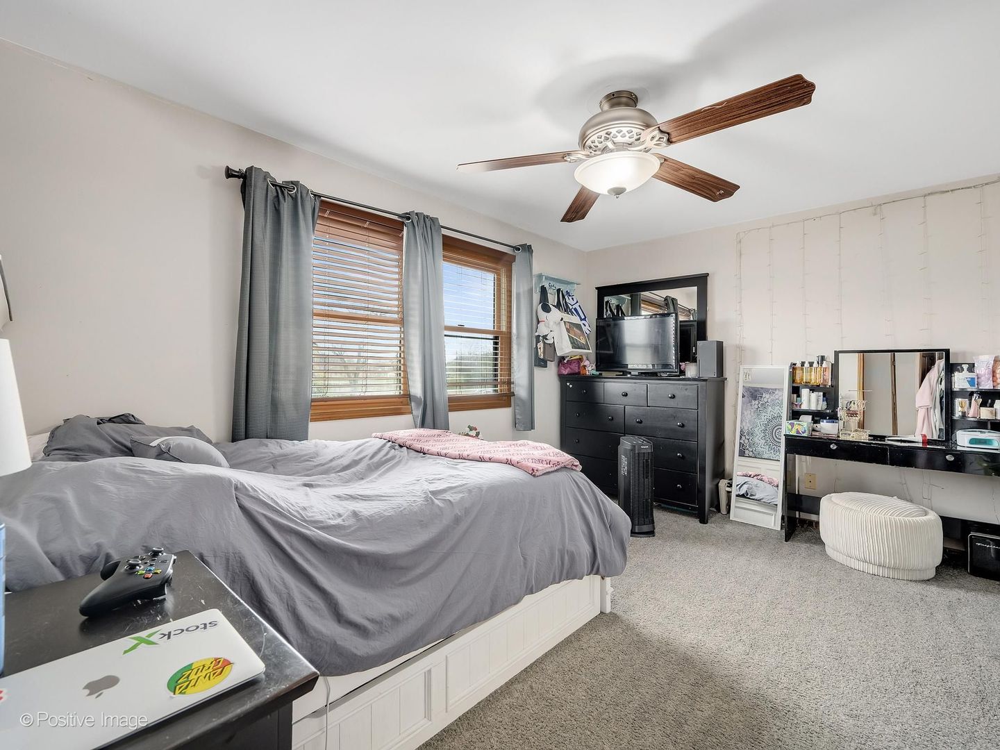612 Stuart Drive Carol Stream, IL 60188 - Photo 20 of 29 a bedroom with a bed and a flat screen tv